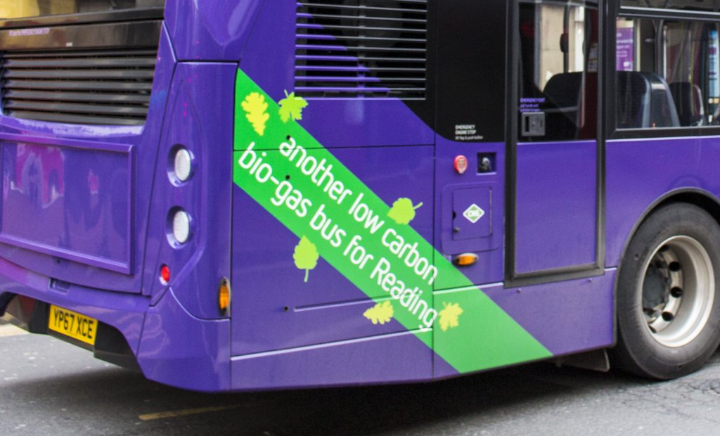 A purple 17 bus showing the "Another low carbon bio-gas bus for Reading" banner at the rear of the bus.