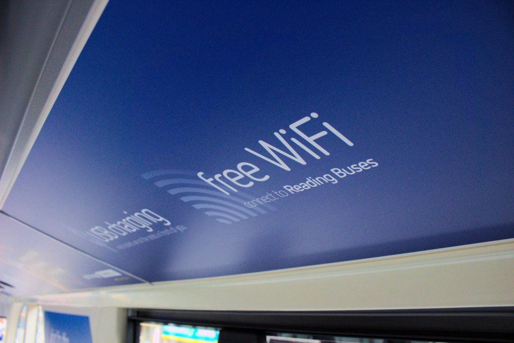 An internal coving panel advertising the free WiFi and USB chargers