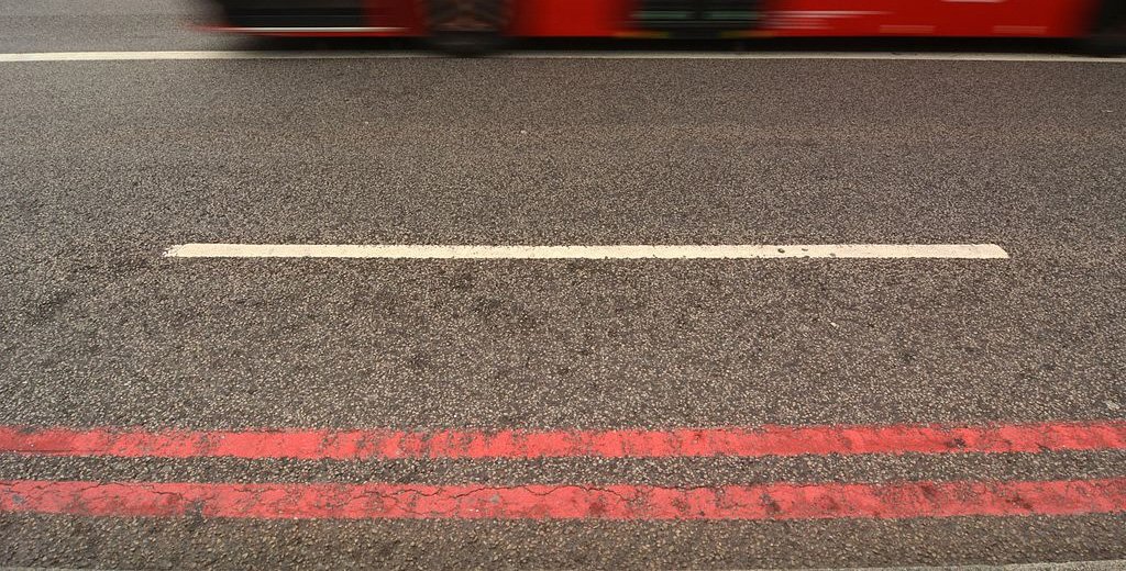 A road with double red lines showing how red routes work